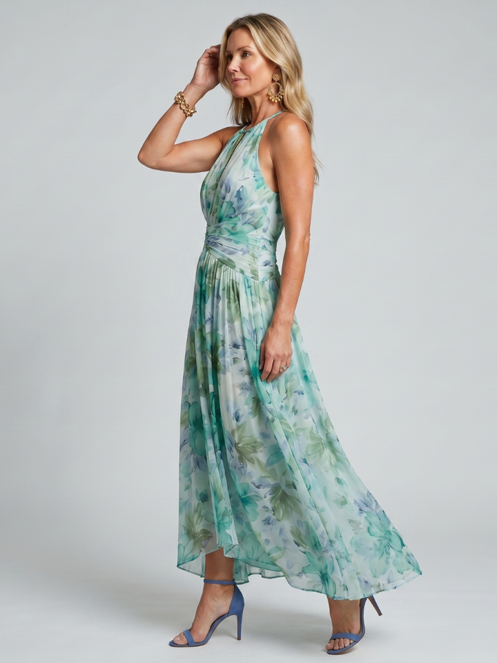 Portia | Vestito midi plissettato con scollo halterneck e motivo floreale delicato